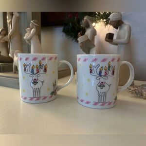 The Toscany Collection Japan reindeer mugs - one has a small chip!